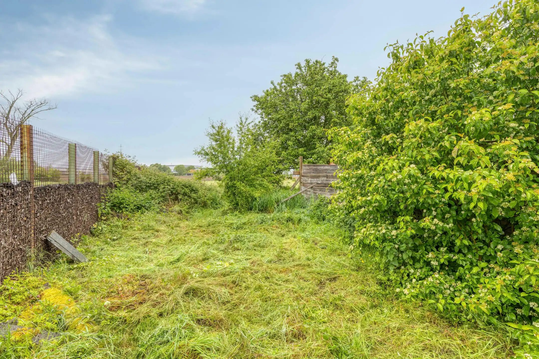 Te renoveren woning met grote tuin en bijgebouw te Heule foto 5