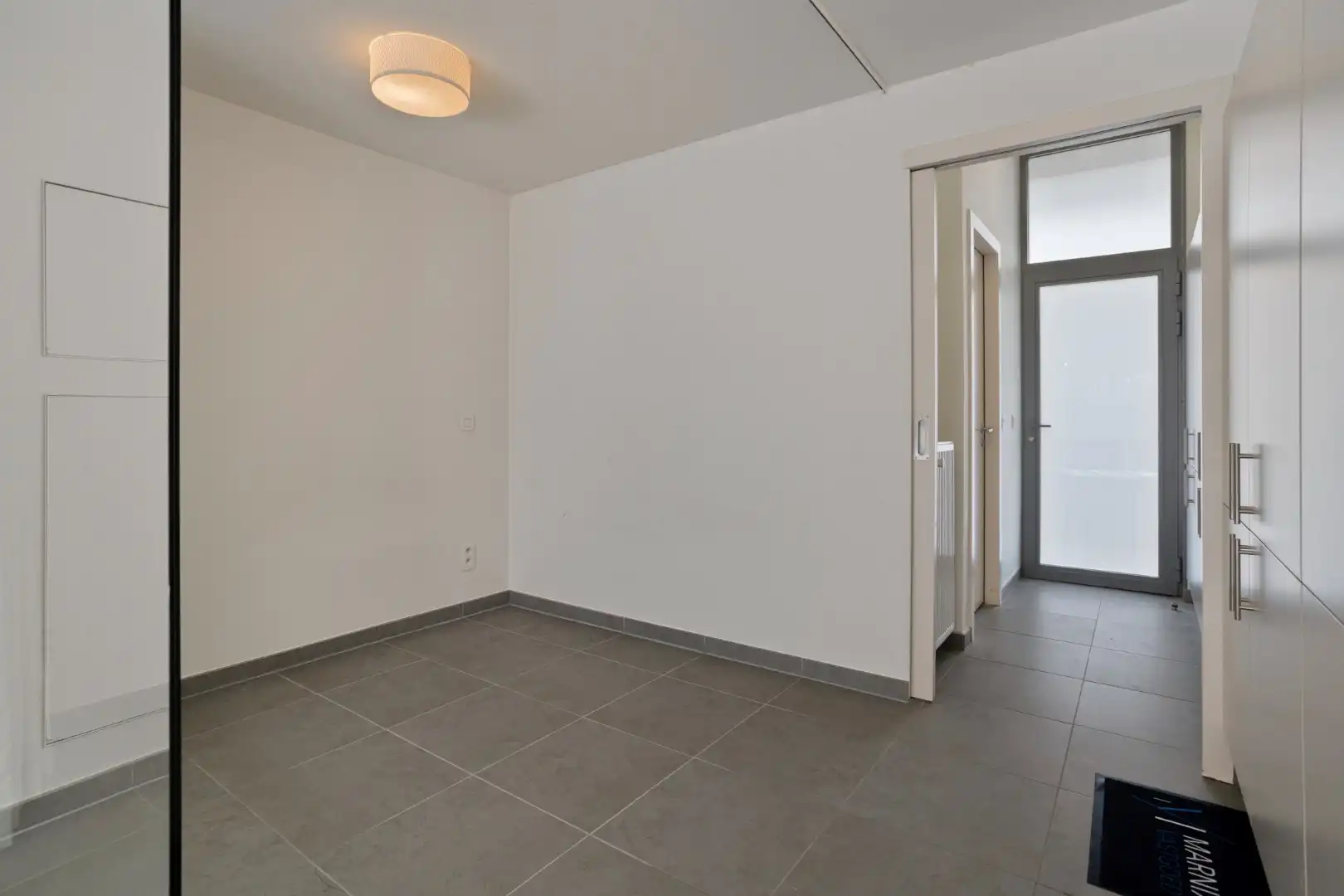 Studio met ruim terras, ondergrondse autostaanplaats en private kelderberging in Leuven! - EPC 60 kWh/m² - bewoonbare opp. 47 m² foto 11