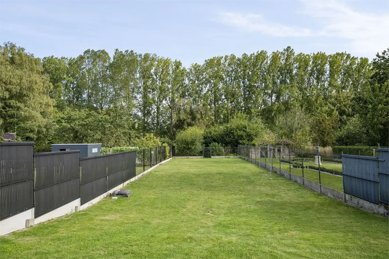 DE IDEALE GEZINSWONING MET ZALIGE TUIN OP EXCLUSIEVE LIGGING DOODLOPENDE STRAAT foto 7