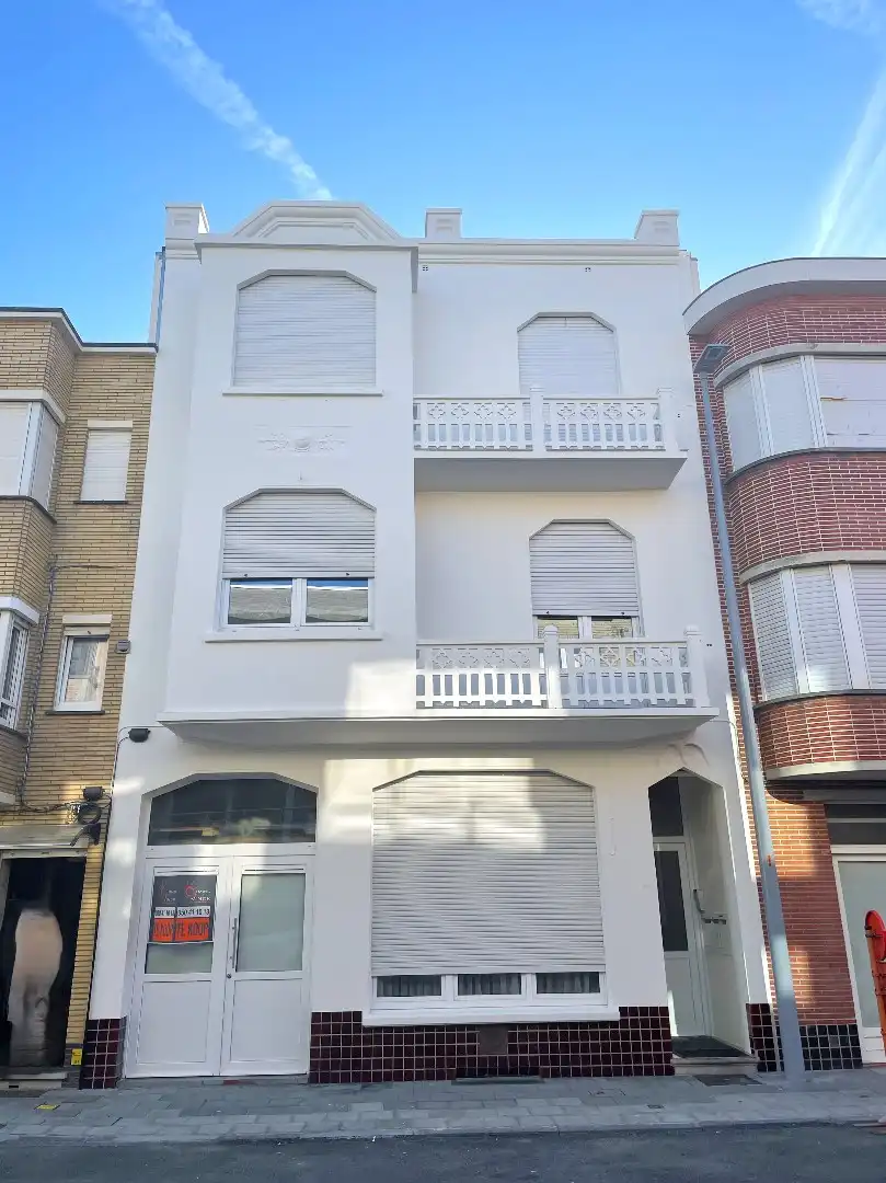 Prachtige interbellumwoning onderverdeeld in drie ruime appartementen foto 18