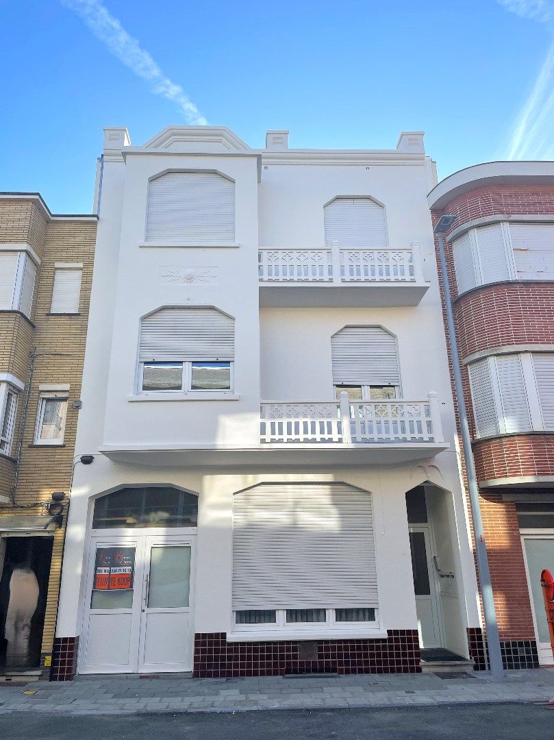 Prachtige interbellumwoning onderverdeeld in drie ruime appartementen foto 18