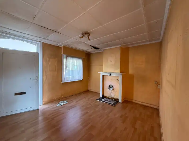 Te renoveren rijwoning met uitgang achteraan! foto 3