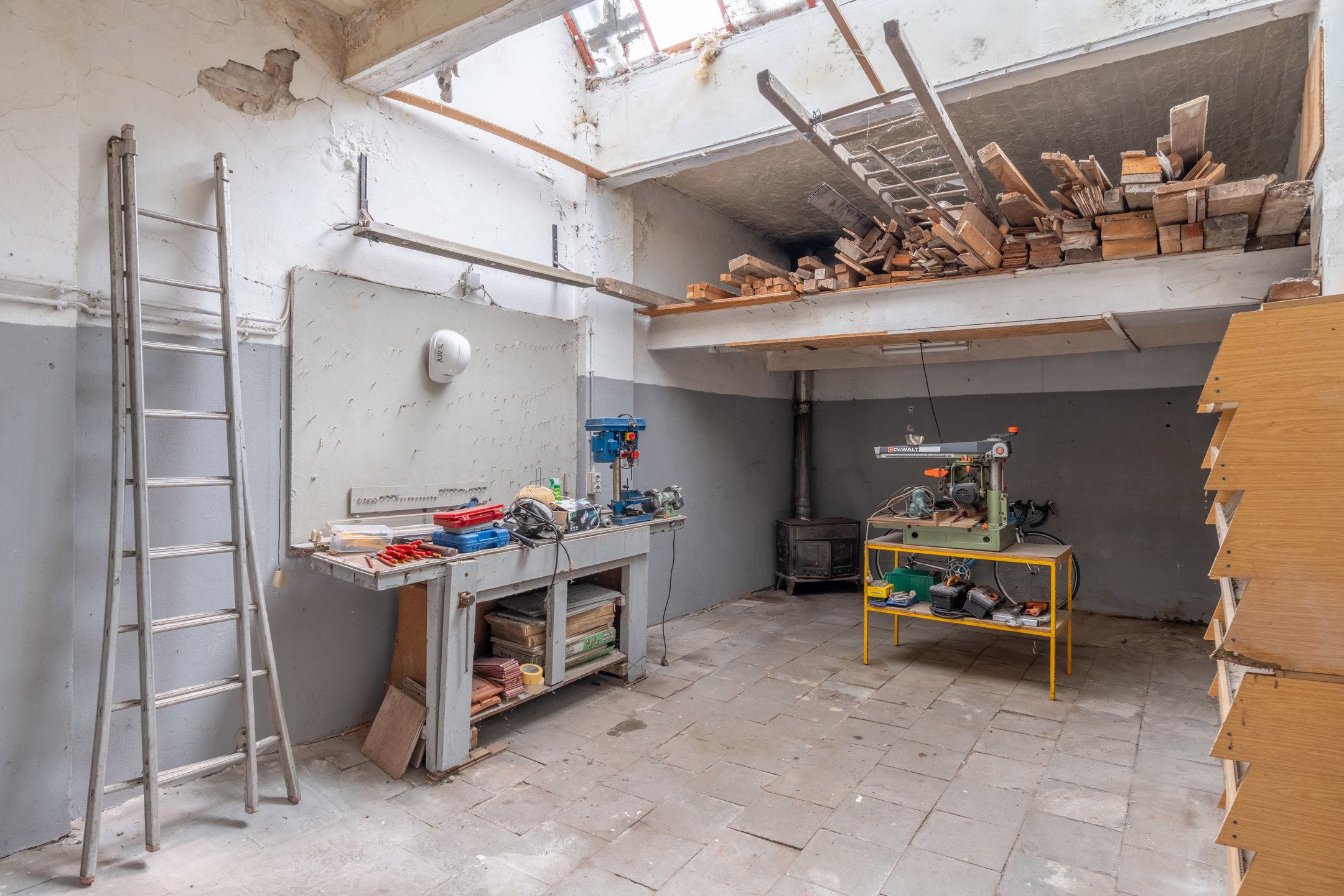 Te renoveren woning met toffe tuin en garage in het centrum foto 41