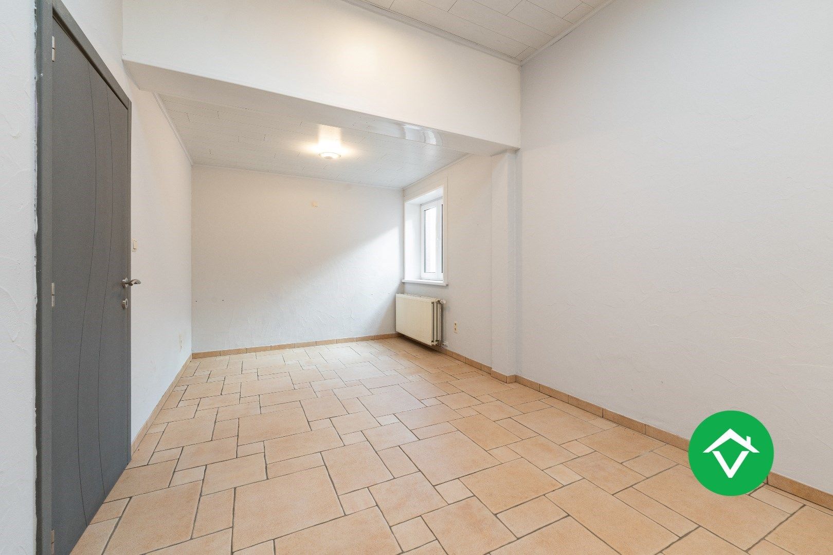 Woning met appartement te koop in het centrum van Eernegem foto 9