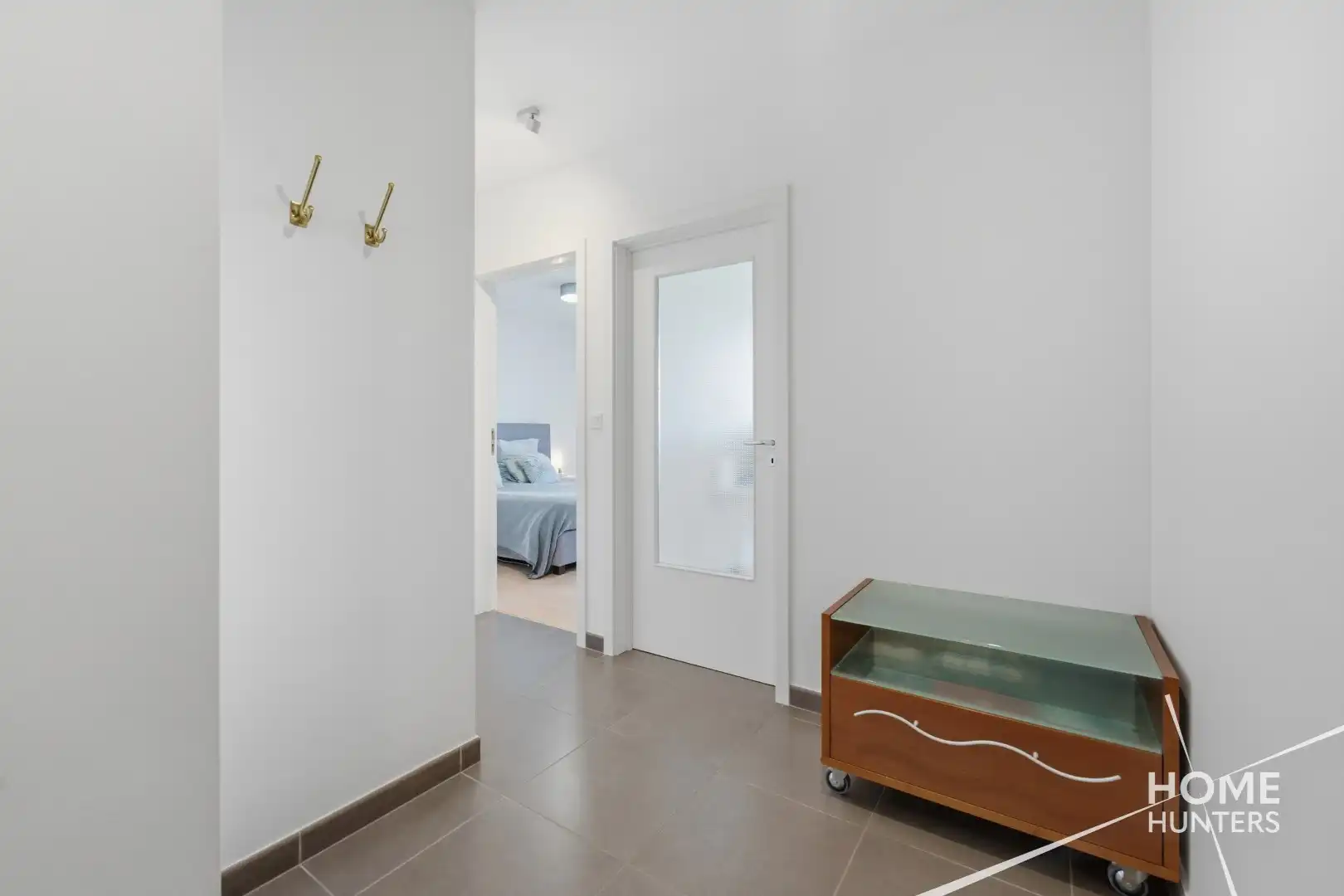 Ruim appartement met twee slaapkamers, een vernieuwde badkamer en 2 unieke terrassen.  foto 12