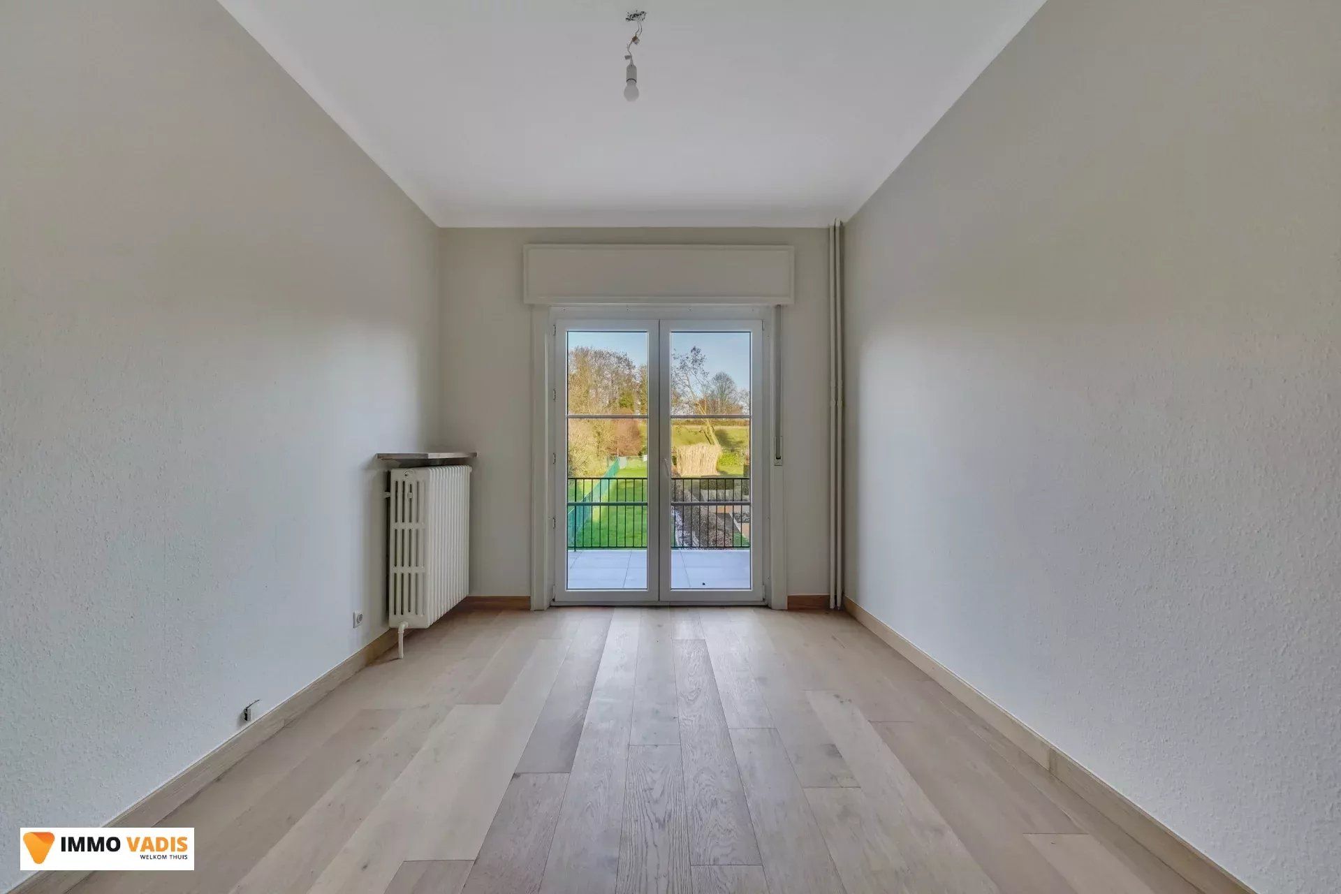 Karaktervolle herenwoning met vier slaapkamers, inpandige garage en tuin foto 10