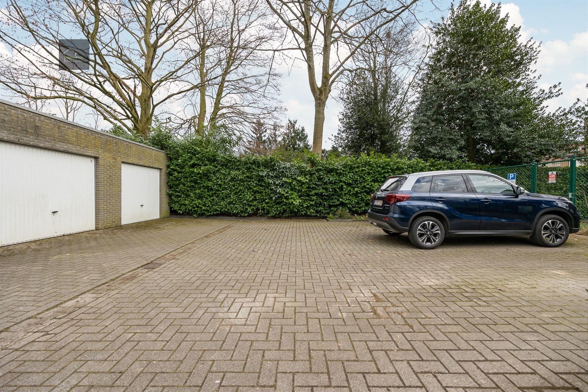 Ruim gelijkvloers appartement met tuin, parking en garagebox foto 19