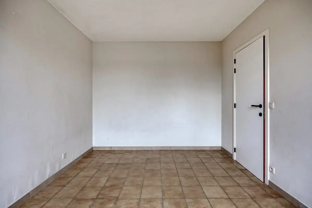 Opbrengsteigendom met 3 appartementen en 7 garages foto 10