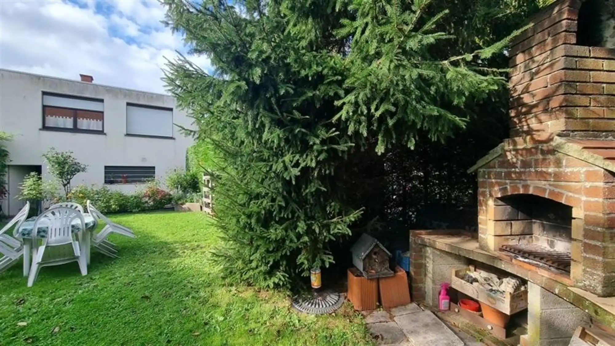 Aangename 3-gevel woning met tuin foto 29