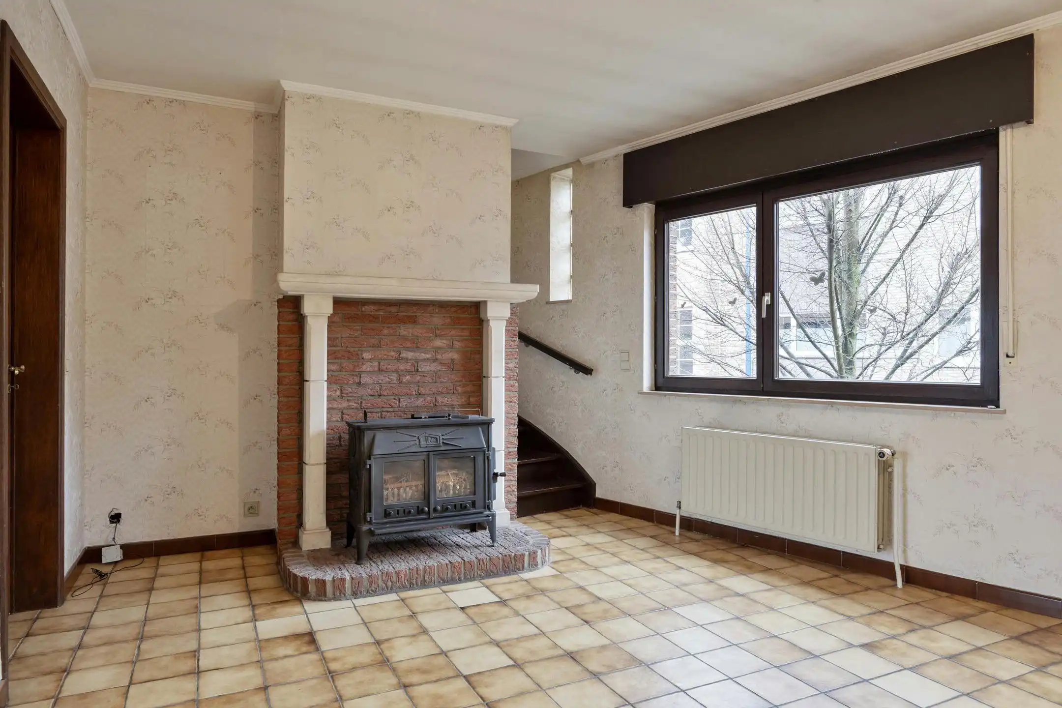 Op te frissen gezinswoning met inpandige garage en tuin op toplocatie in Strombeek! foto 11