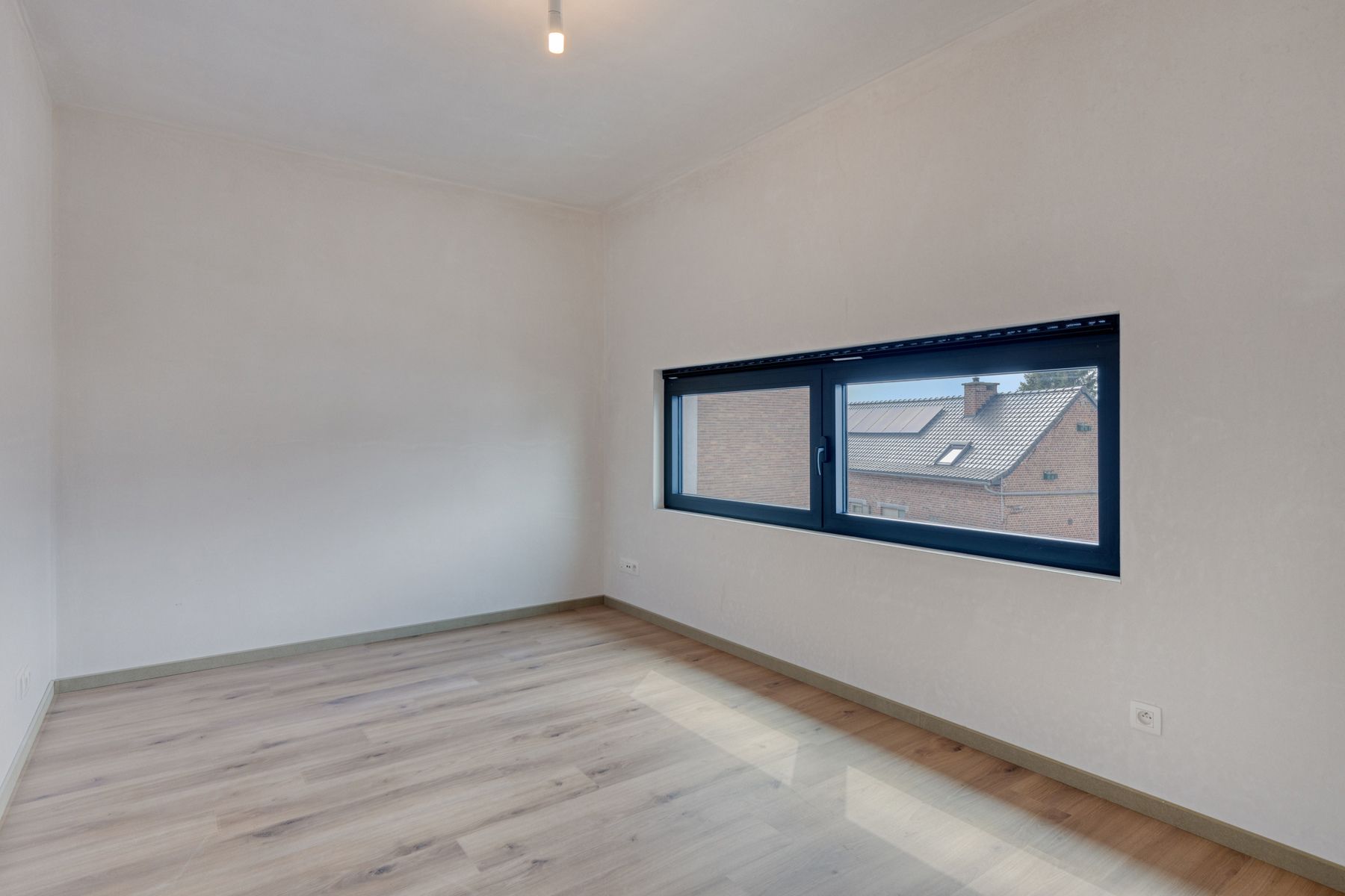 Nieuwbouw duplex appartement met ruim terras in het centrum foto 12