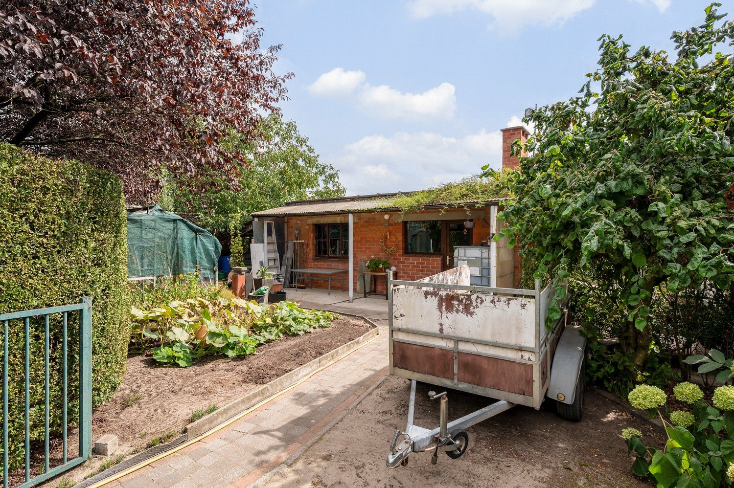 Ruime gezinswoning op breed en groot perceel van 1122m² foto 38