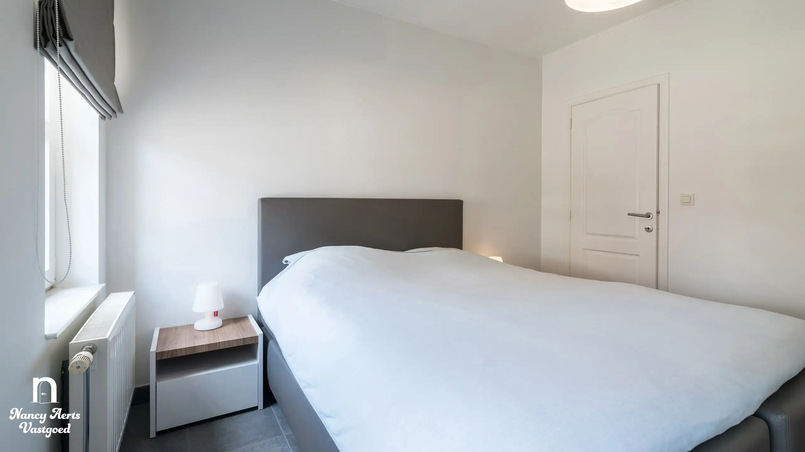 Lichtrijk gelijkvloers appartement met tuin en mooi uitzicht foto 14