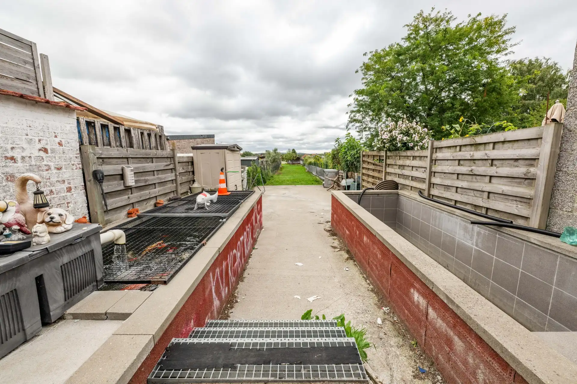 Charmevolle te renoveren woning met 3 slaapkamers en tuin op perceel van 405 m² te koop in Aalbeke foto 15
