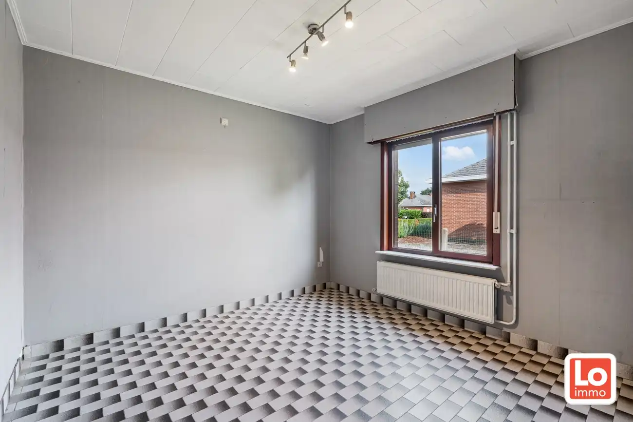 VERKOCHT! Degelijke open gelijkvloerse bebouwing met inpandige garage op een toplocatie in Lochristi! foto 14