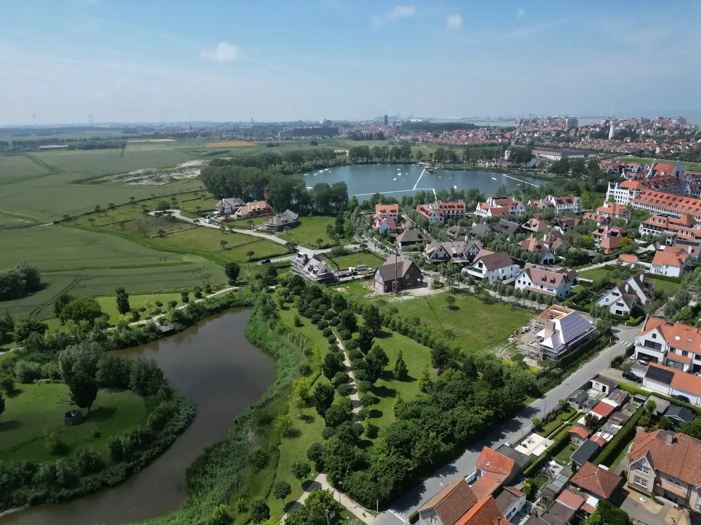 GOLFLOT:   bouwperceel met open zicht rechtstreeks op toekomstige golf van Duinenwater.  foto 5