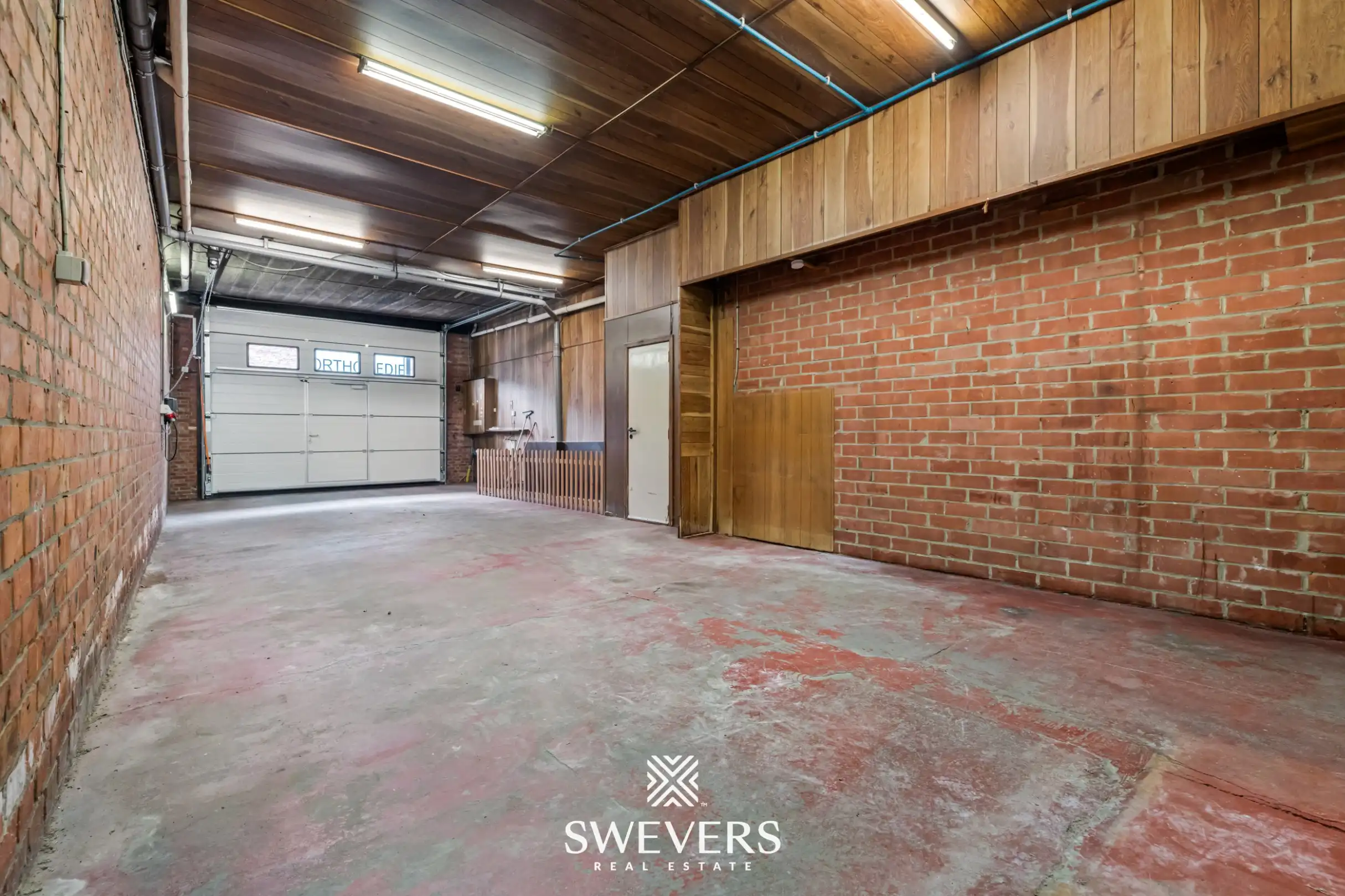 223 m² woonruimte met uitzonderlijke garage van ca. 100 m² nabij centrum foto 19