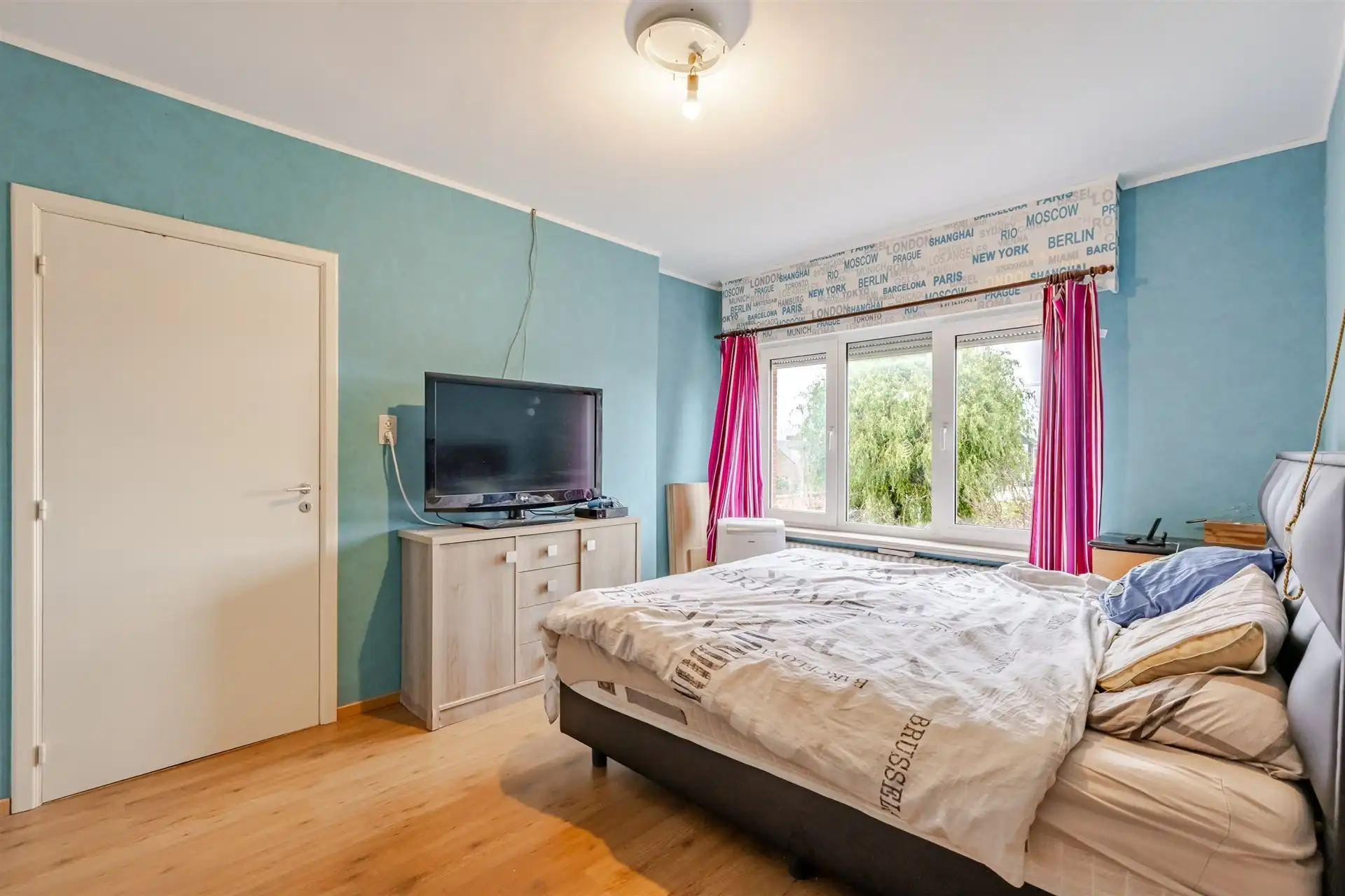 Op te frissen woning met supertoffe tuin, nabij het centrum! foto 13