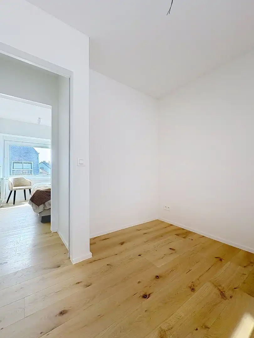 Volledig gerenoveerd appartement met parkeerplaats en lateraal zeezicht te Koksijde foto 11
