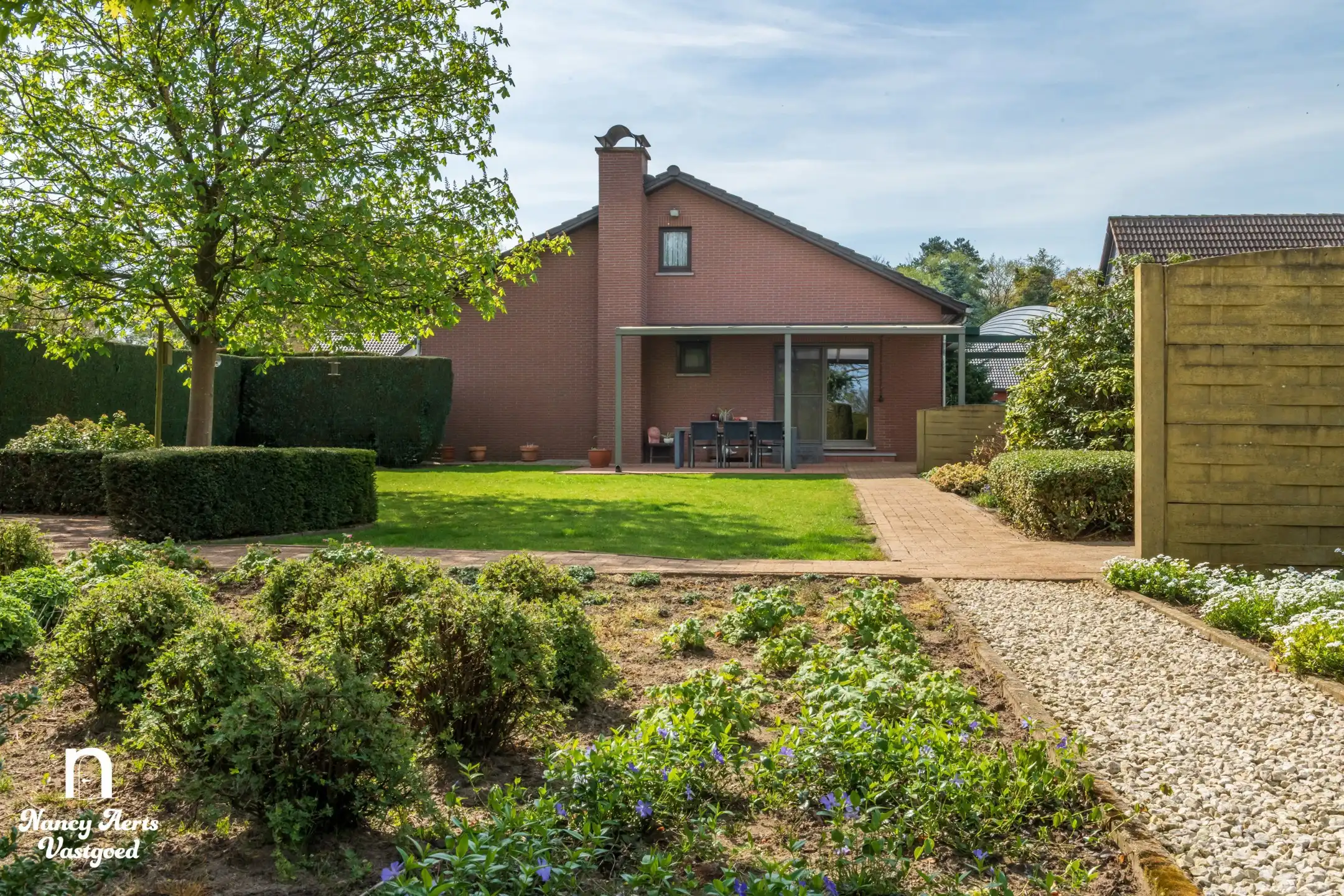Lichtrijke woning met prachtige tuin en groeipotentieel foto 19