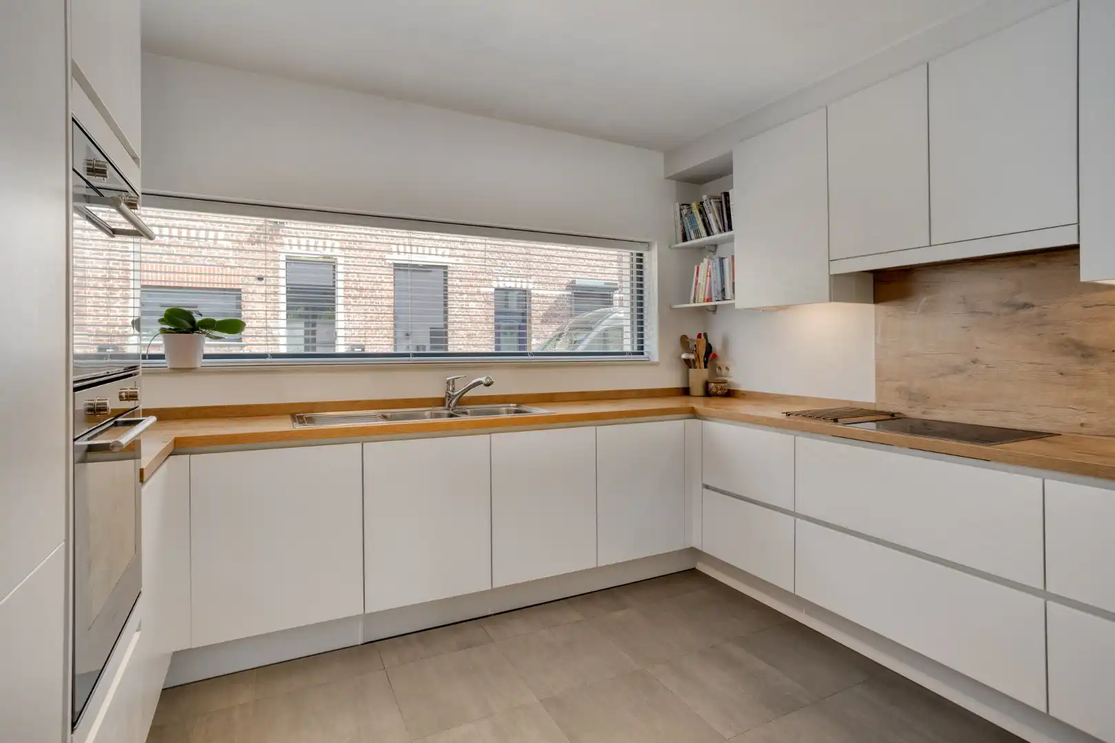Instapklare woning met 4 slaapkamers, aangename leefruimte met staanplaats - EPC 89Kw/m² foto 4