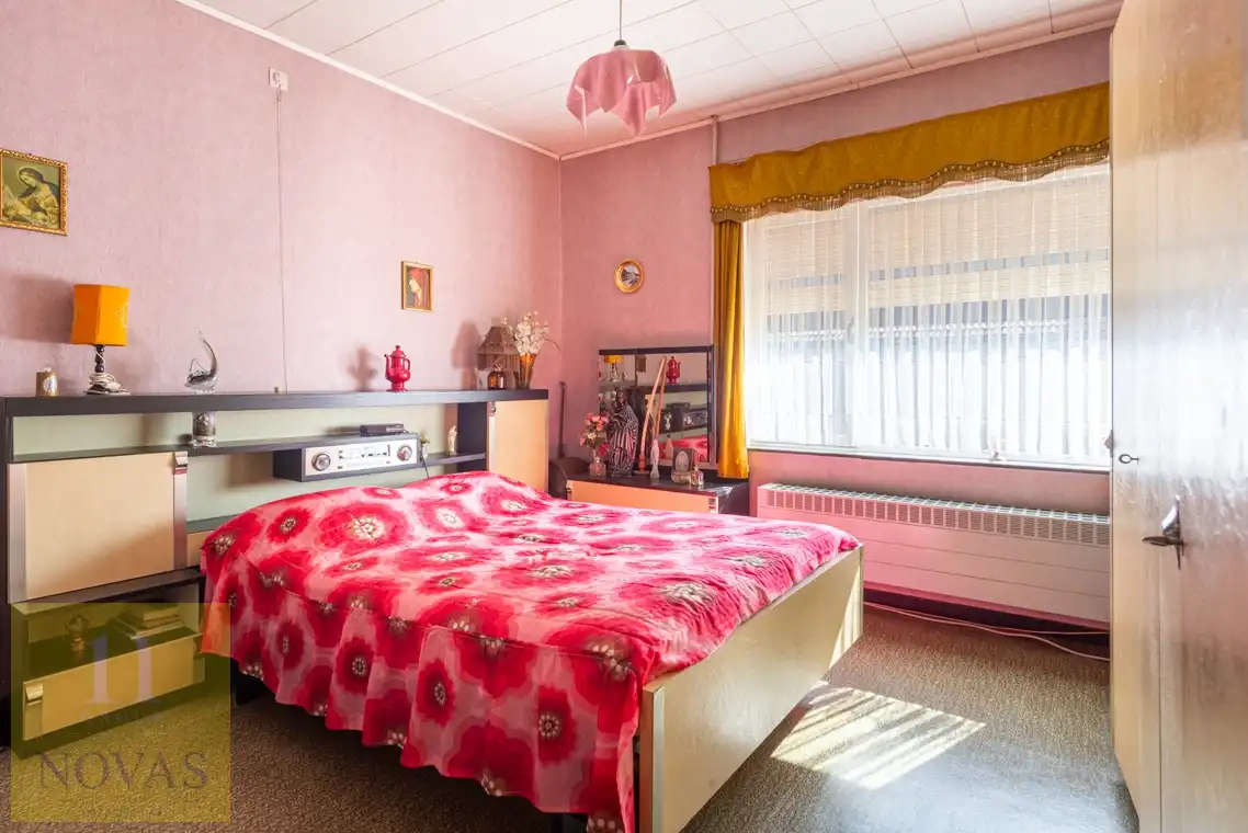 Landelijk gelegen woning op een perceel van 15 are, 23m straatbreedte foto 20