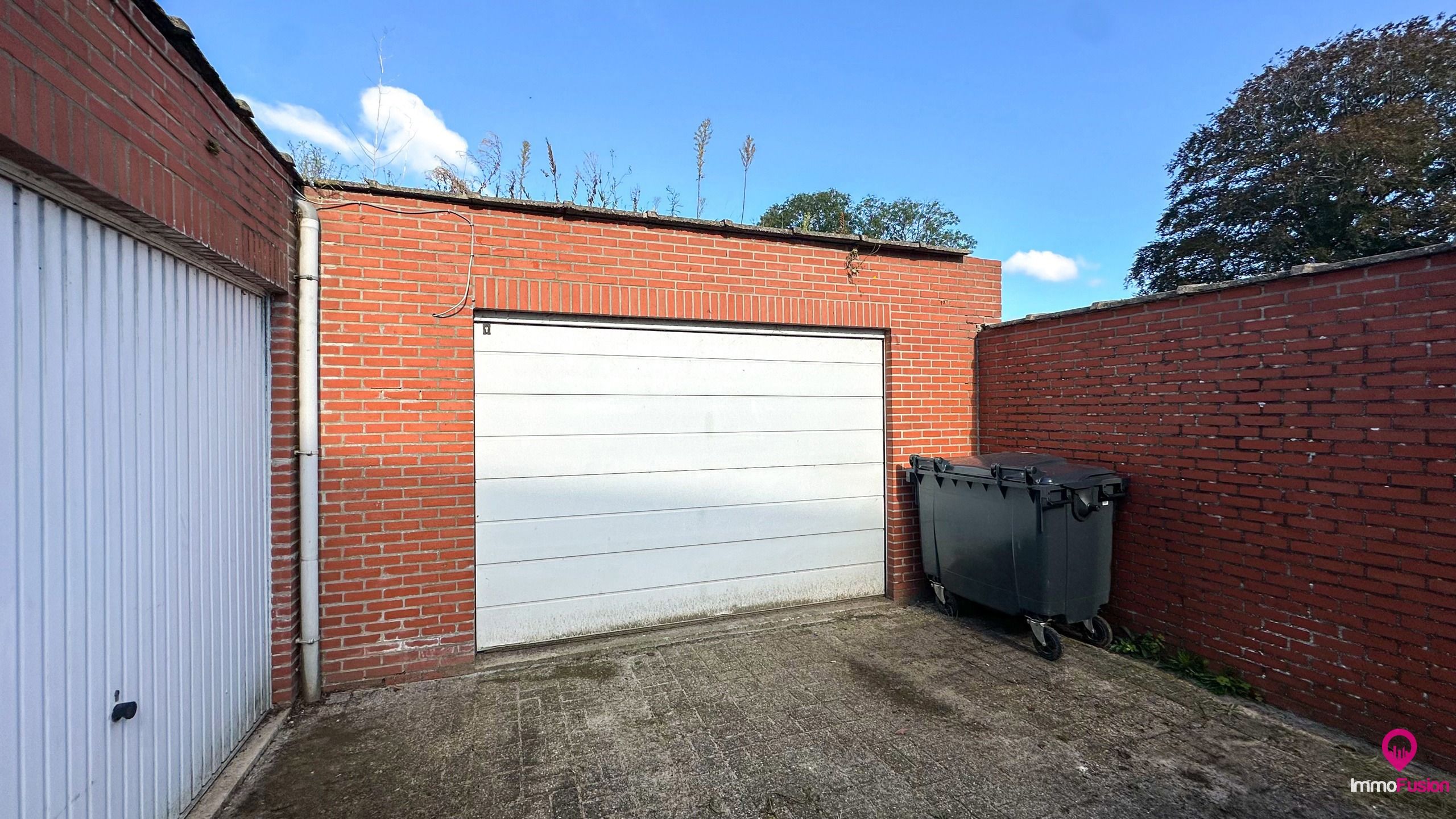 Ruim handelspand met garage in het centrum van Beringen! foto 16