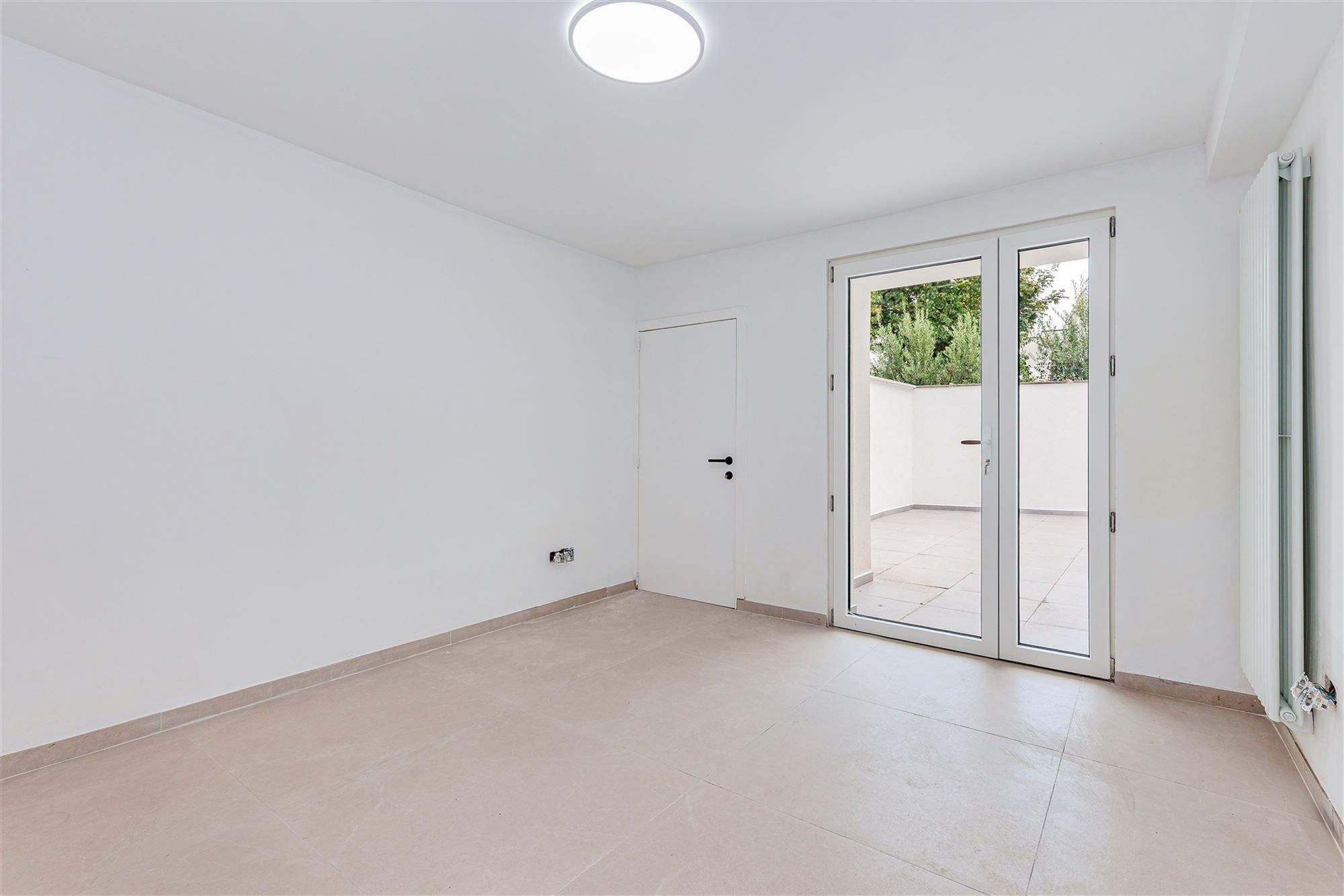 Gelijkvloers duplexappt met 3 slk + tuin foto 19