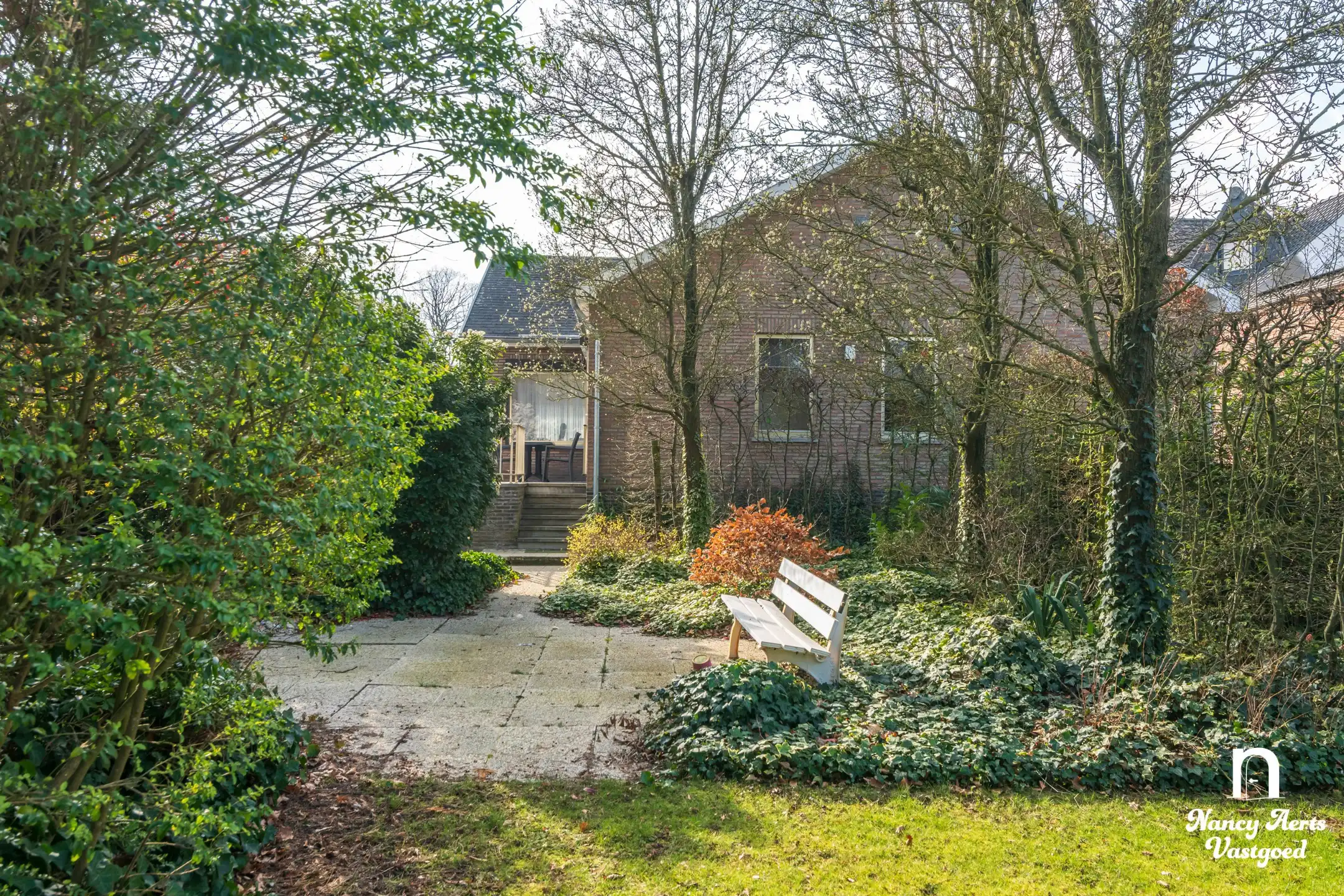 Goed onderhouden gezinswoning met grote tuin foto 7