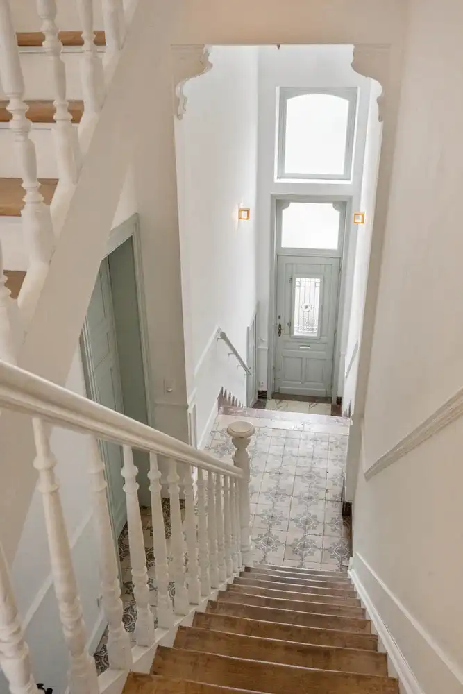 Prachtig gerenoveerd en energiezuinig herenhuis met 5 slaapkamers, 2 badkamers en een tuin op een toplocatie nabij het station van Leuven! foto 20