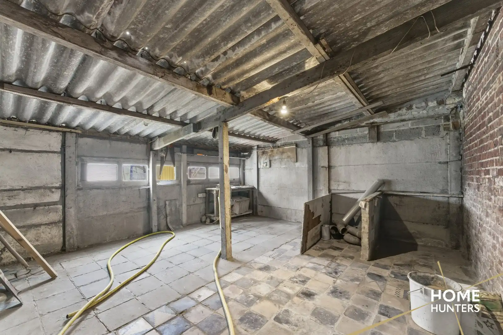 Te renoveren woning met garage en bijgebouw in hartje Poelkapelle! foto 14