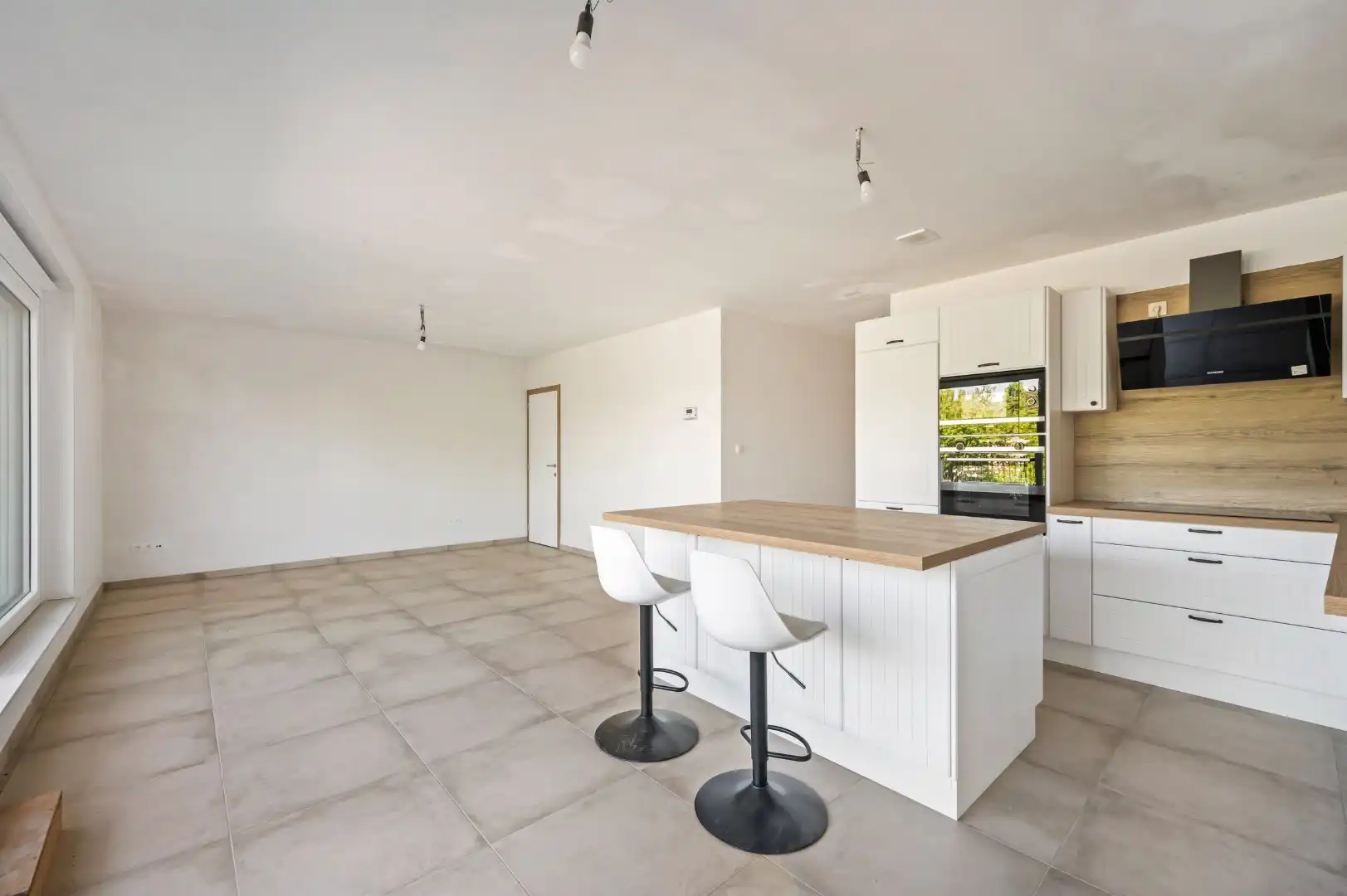 NIEUWBOUWAPPARTEMENT MET EPC A, 2 SLPKS EN ZONGERICHTE TERRAS foto 8