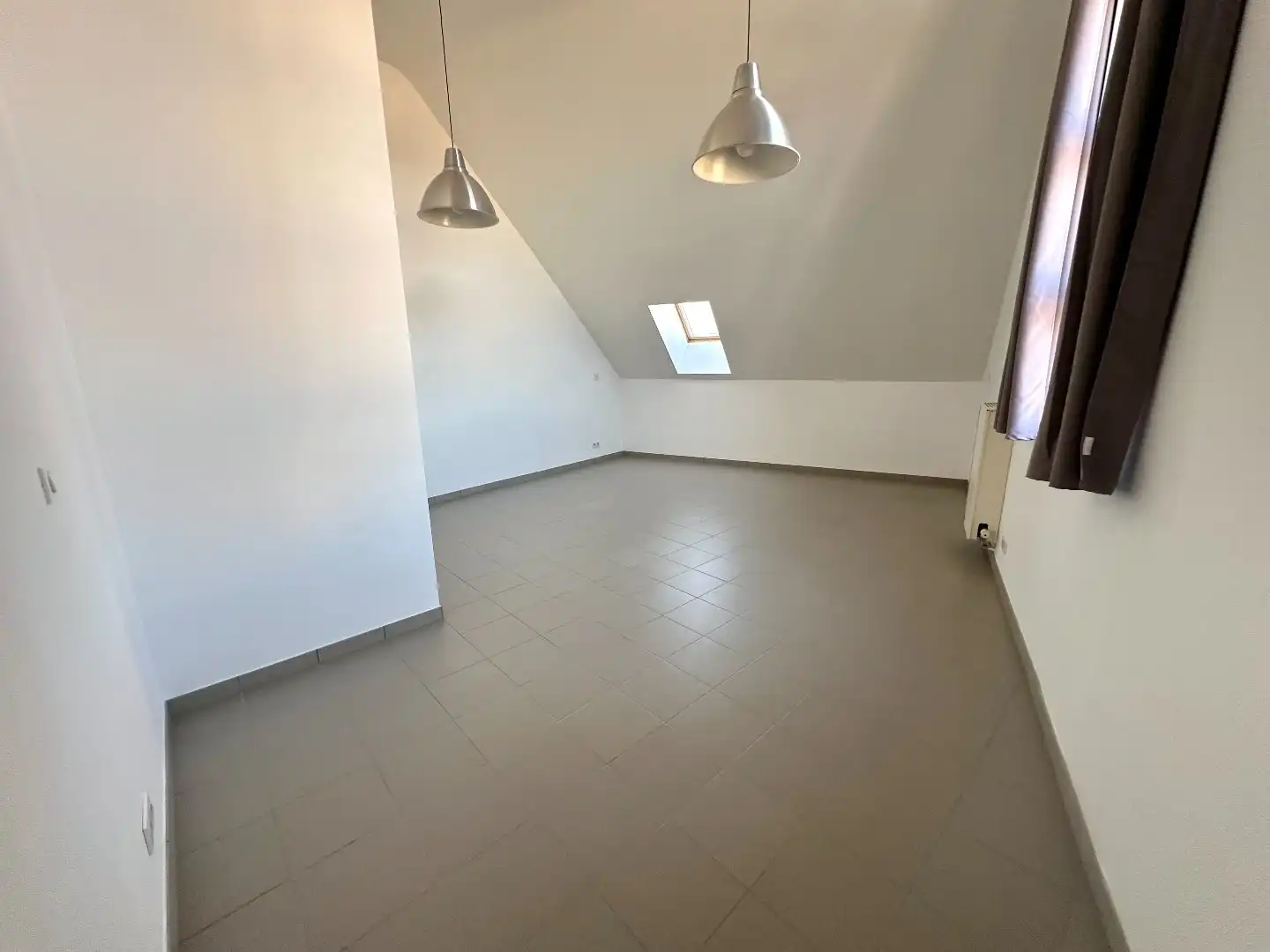 Gezellig duplexappartement op de 2e verdieping, centraal gelegen in het hart van Tongeren. foto 9