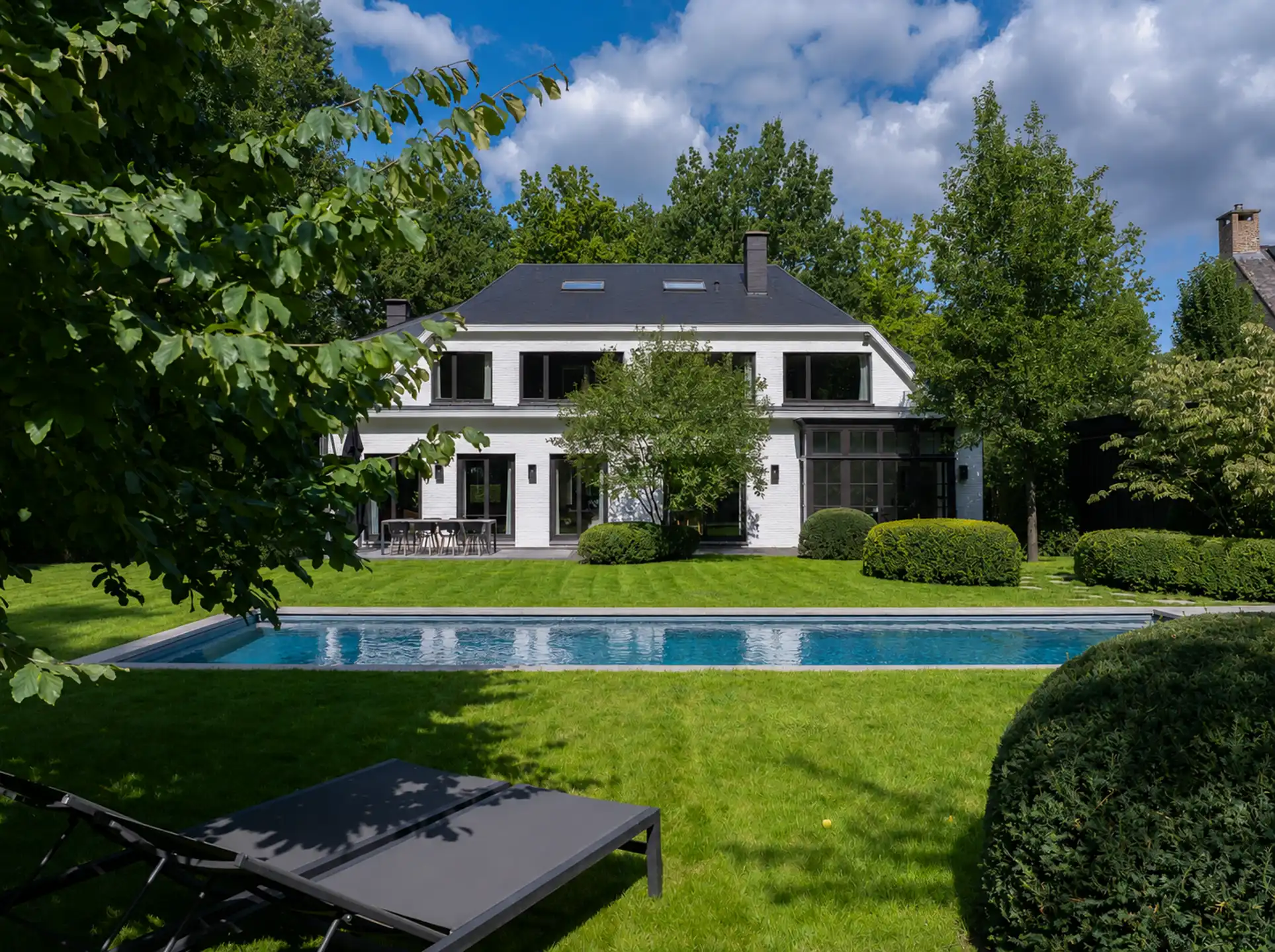 Tijdloze Vlassak-Verhulst-villa aan het Driehoeksbos foto {{pictureIndex}}