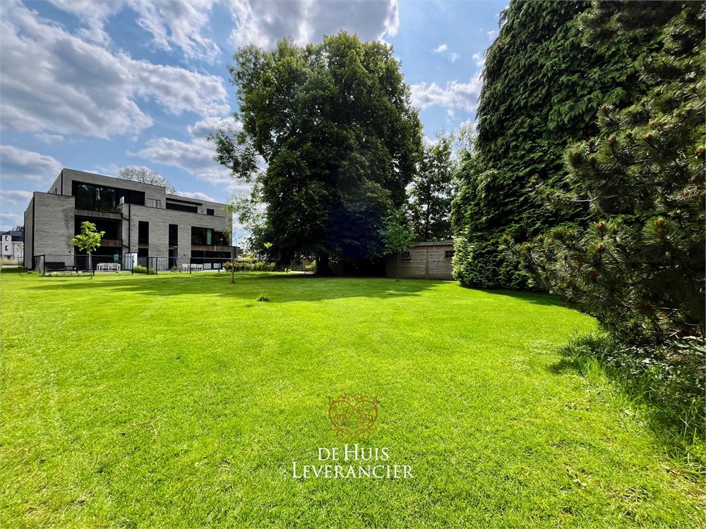 Discrete luxe & tijdloze elegantie : subliem nieuwbouwappartement met terras en gemeenschappelijk tuin te koop in Boechout foto 39