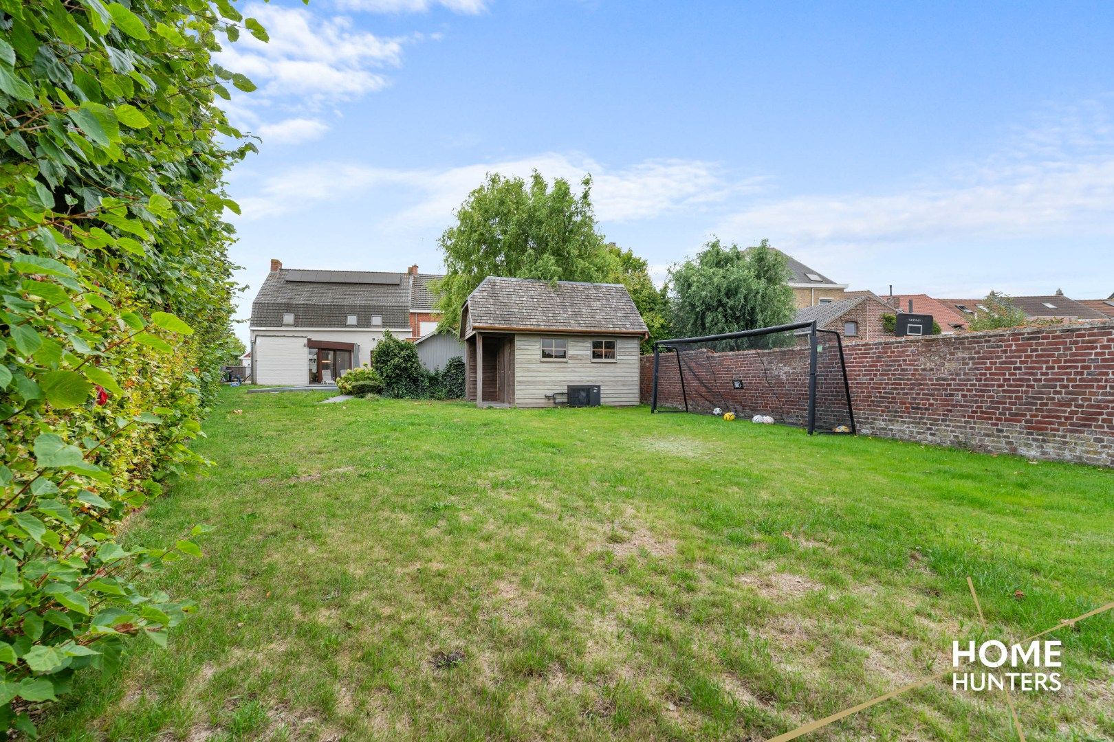 Ruime woning met 4 slaapkamers, een ruime zonnige tuin met verwarmd zwembad foto 11