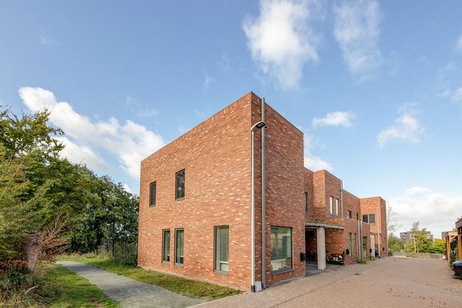 Modern passiefhuis bij de Schelde foto {{pictureIndex}}