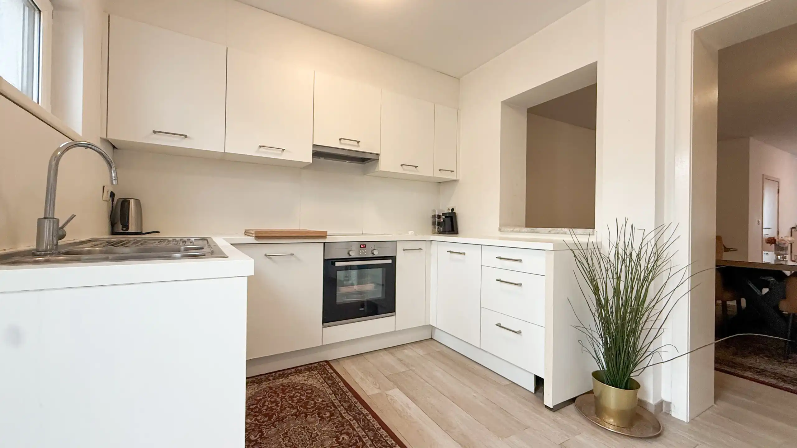 Instapklaar gelijkvloers appartement in Heusden! foto 12