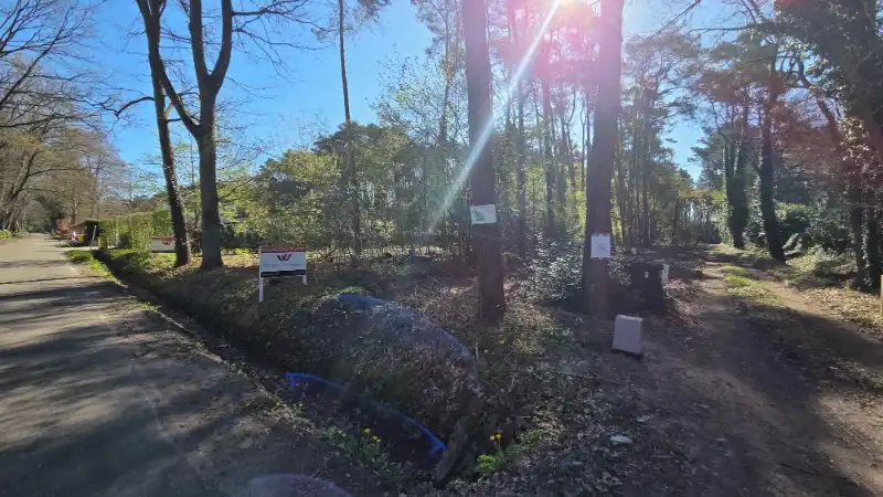 Residentieel gelegen bouwgrond van 15 are voor open bebouwing nabij golf- en meerdomein foto 3