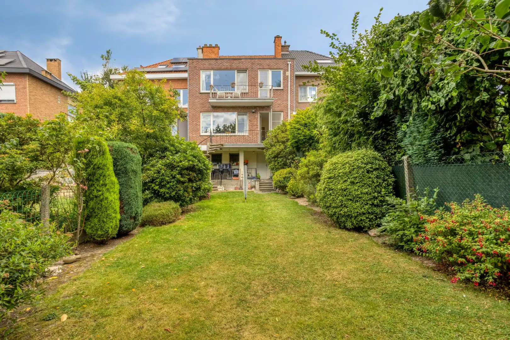 Opbrengsteigendom met tuin en 2 verhuurde appartementen in Wemmel foto 25