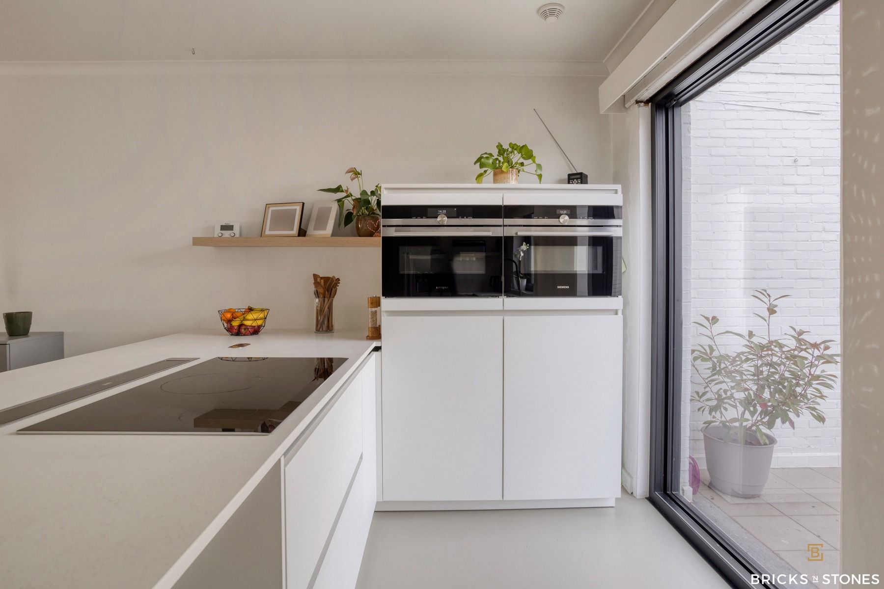 Knappe bel-etage woning met tuin foto 12