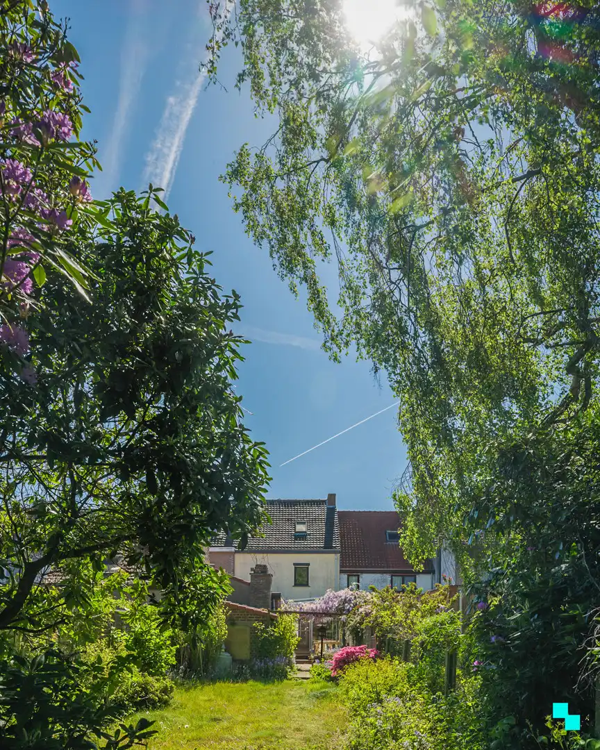 Te renoveren woning met gezellige tuin in het hart van Merelbeke foto 24