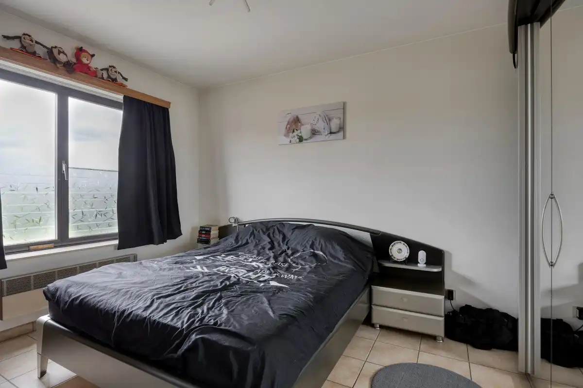 Opbrengsteigendom met 3 appartementen en 7 garages foto 27