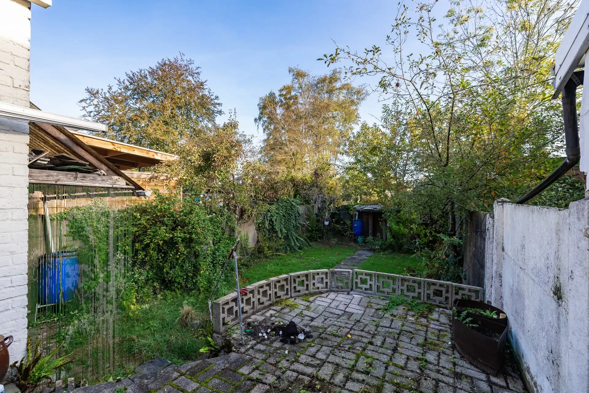 Charmante rijwoning met garage en groene tuin, klaar voor jouw stempel foto 16