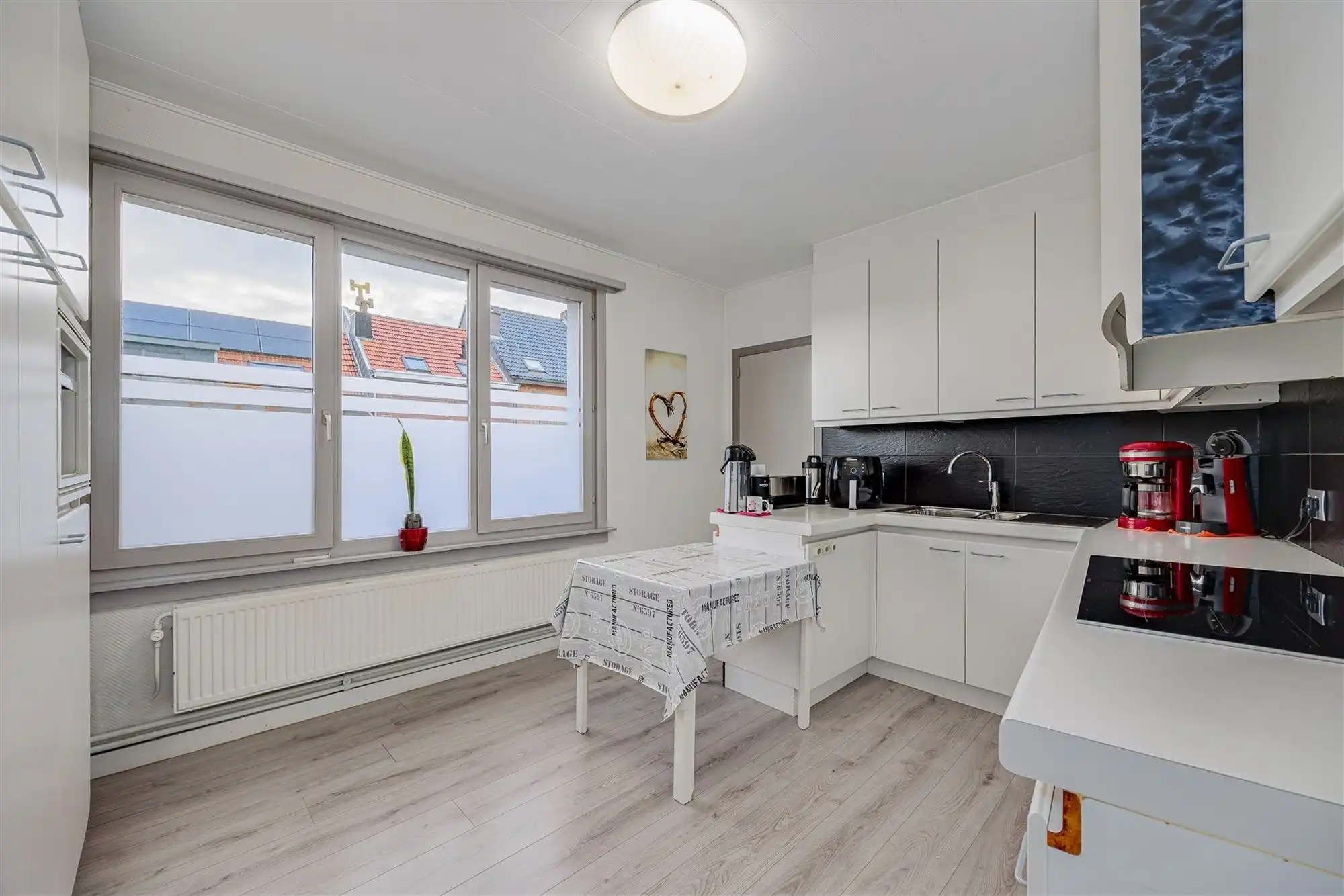 Uniek hoekperceel met handelshuis + garage + appt foto 7