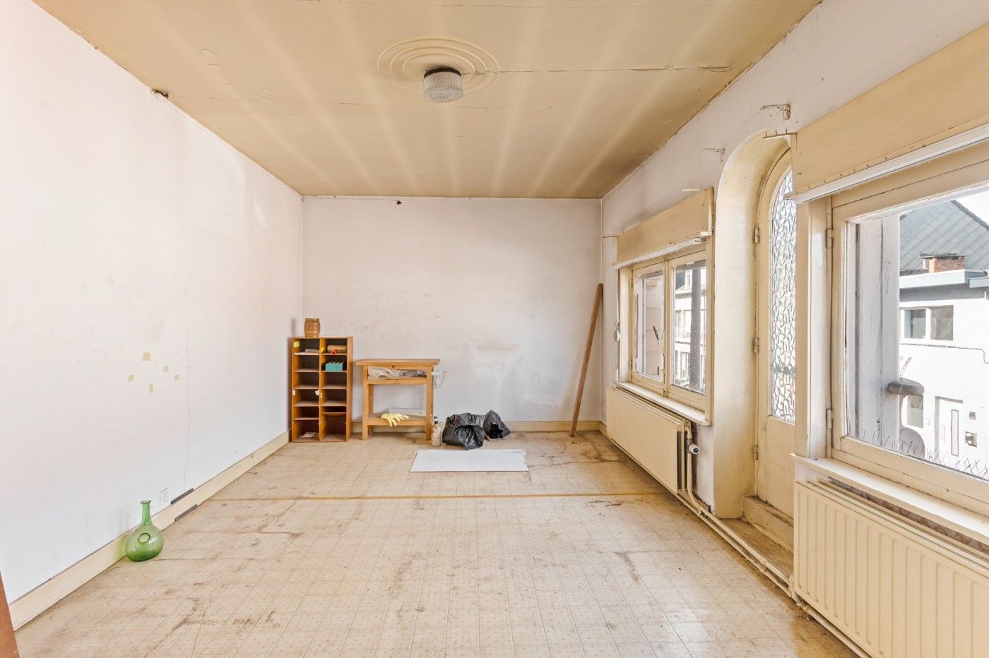 Te renoveren woning met 2 slpk., garage en grote tuin foto 10