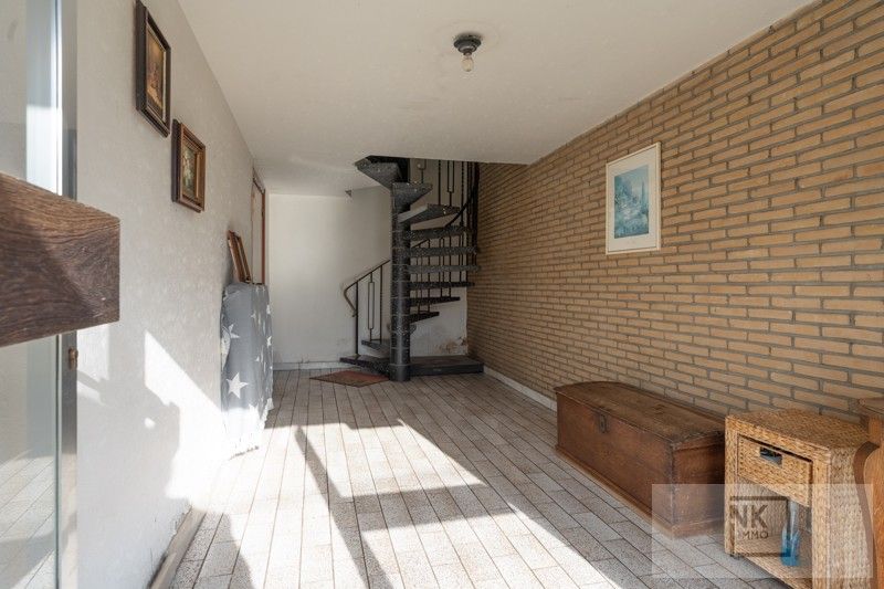 Ruime bel-etage woning met grote grond op een aangename ligging in Arendonk foto 3