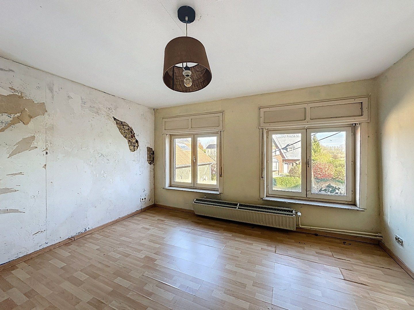 Ruime Gezinswoning met Zonnige Tuin en Renovatiepotentieel foto 16