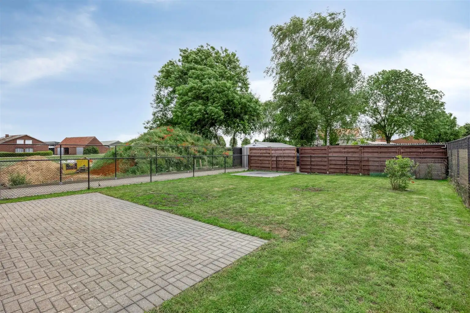 Instapklaar gelijkvloers appartement met 2 slaapkamers, ruime tuin en parkeergelegenheid op een rustige toplocatie in Opitter.  foto 9