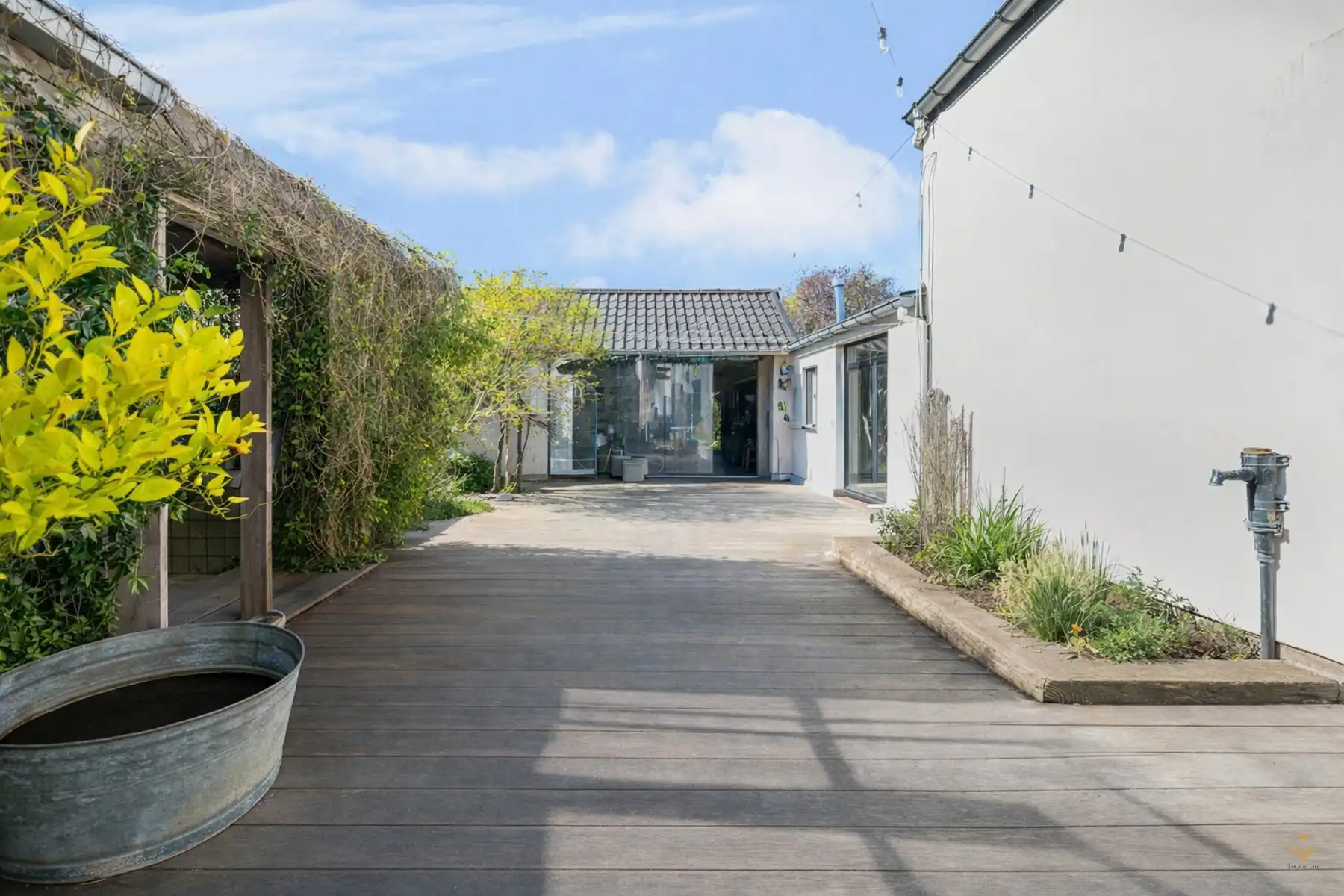 Uniek perceel met 2 volwaardige woningen en gedeelde tuin!  foto 14